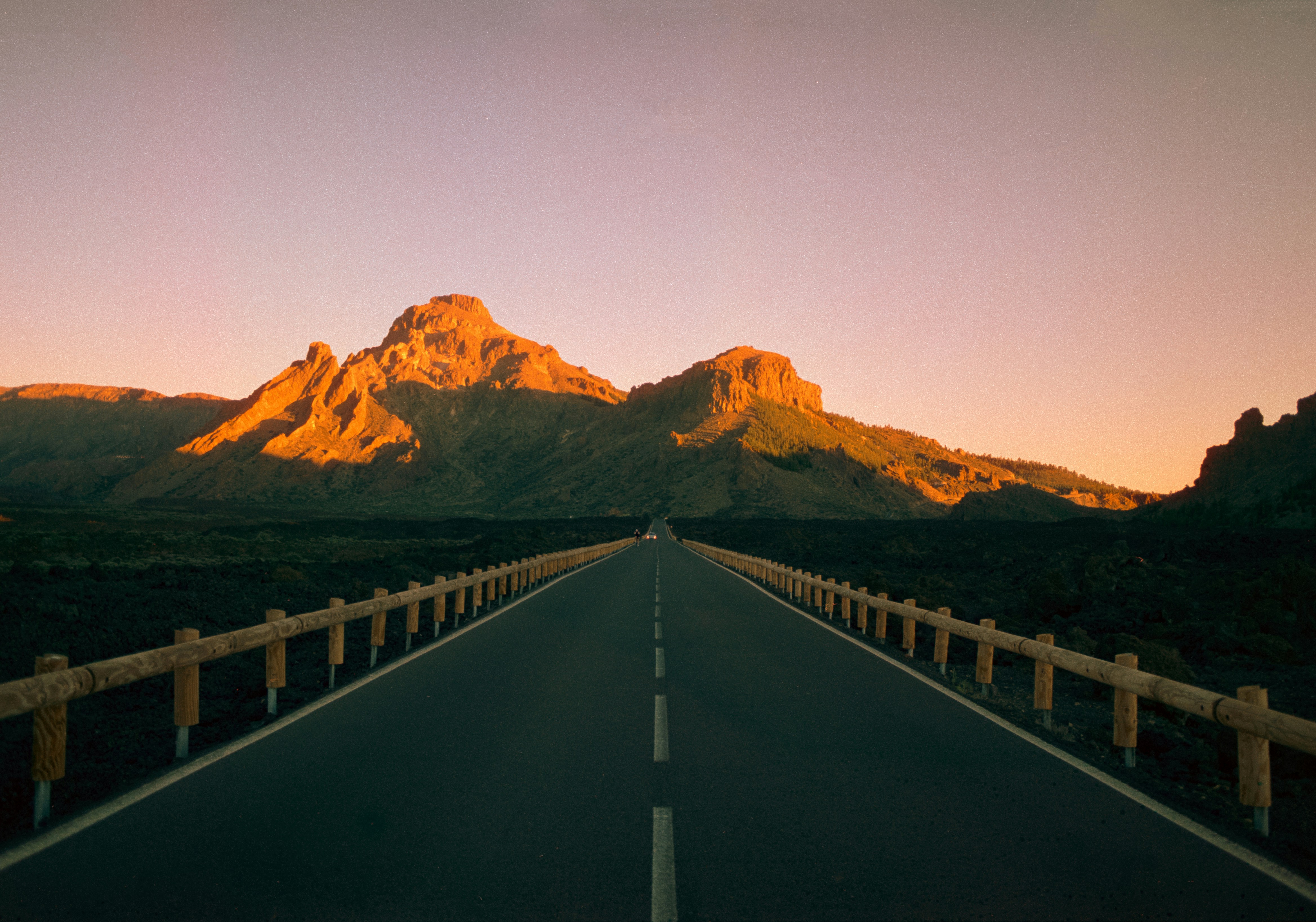 An open road through a sunset landscape — payments that go through anywhere